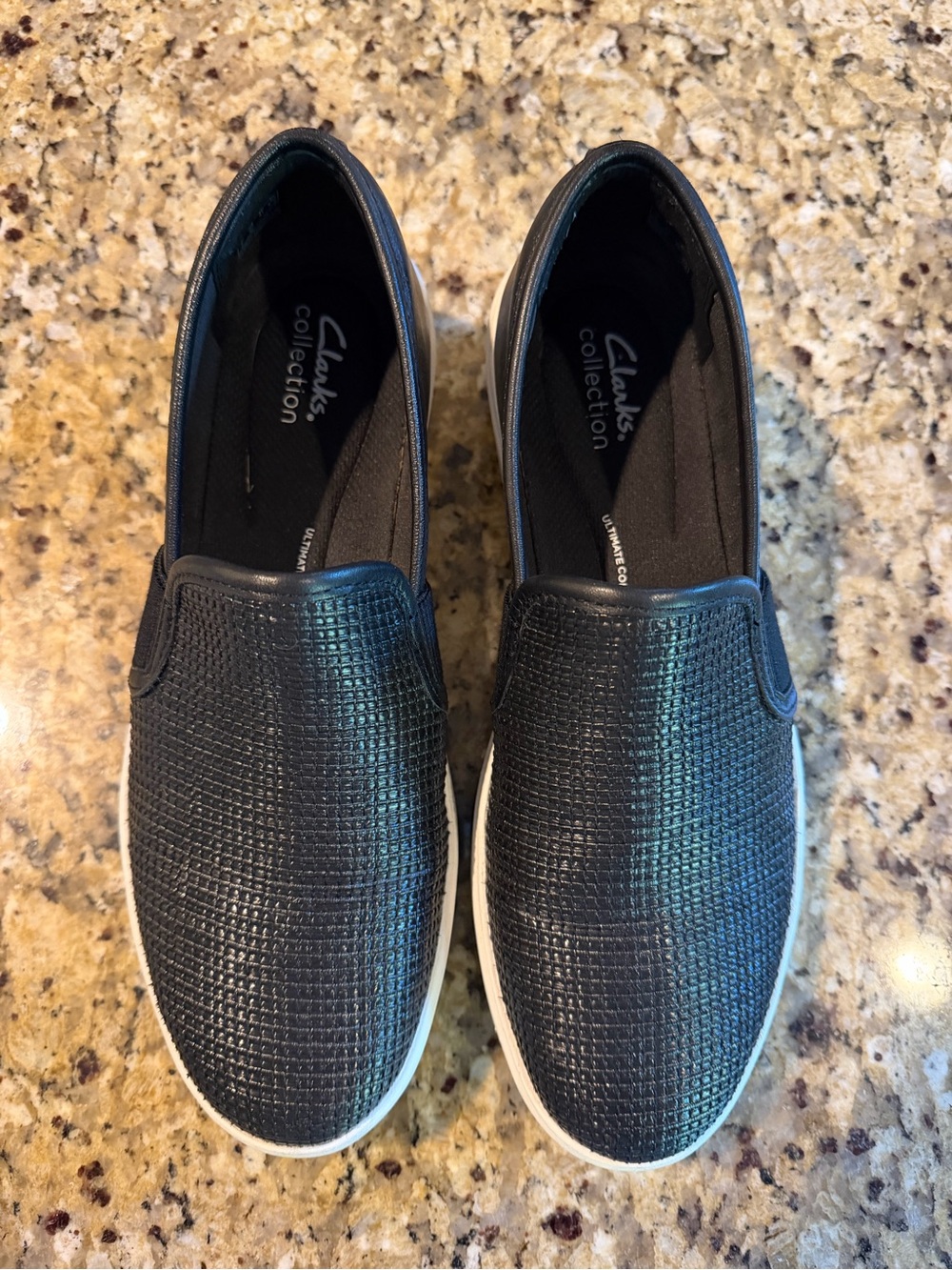 Woman's Black Slip-On Sneakers